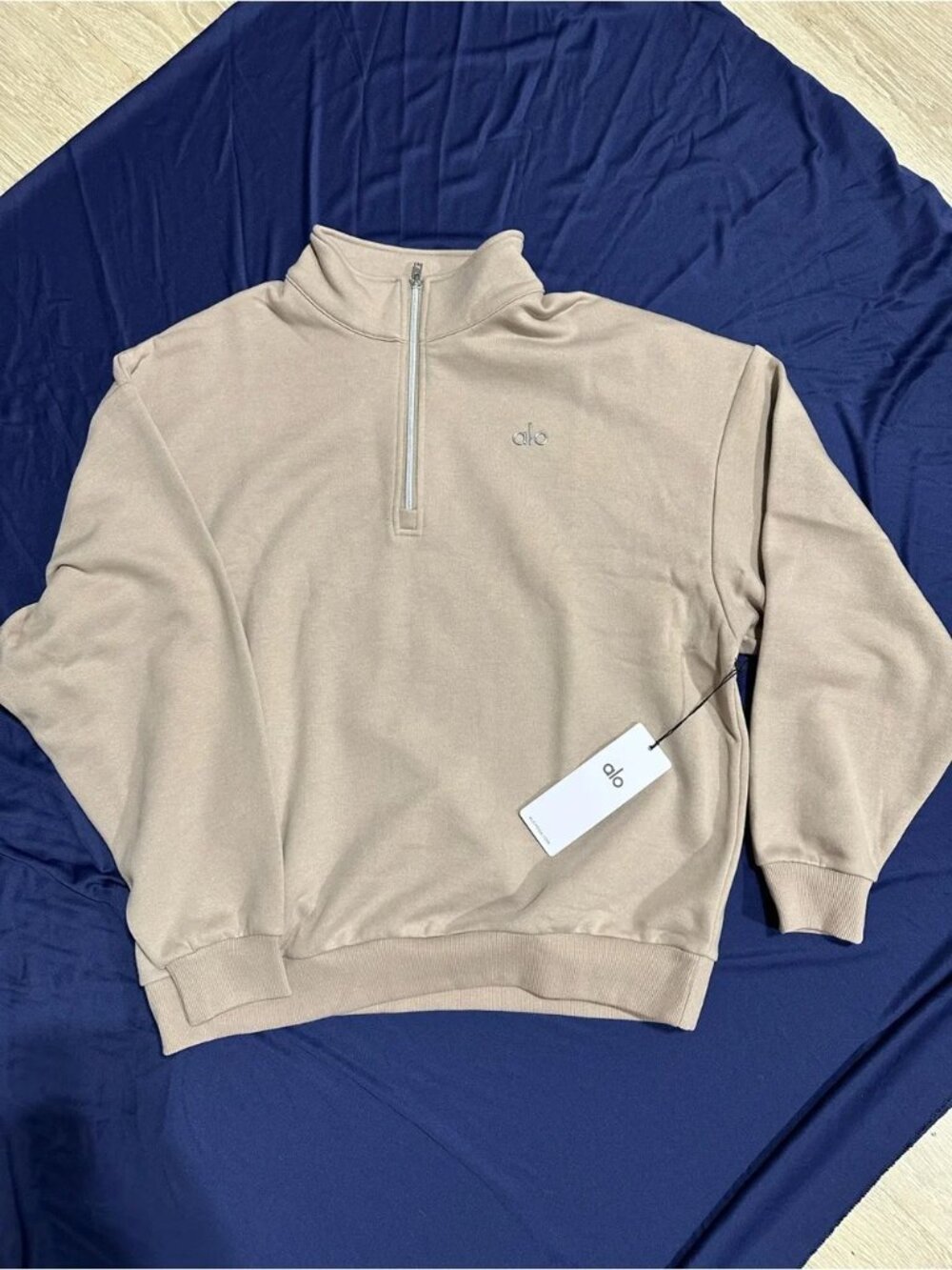 ALO Yoga Unisex Half-Zip Pullover Sweatshirt in Light Cocoa